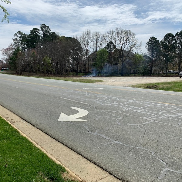 This is a spacious outdoor space located at a very busy corner lot in Cary, NC 