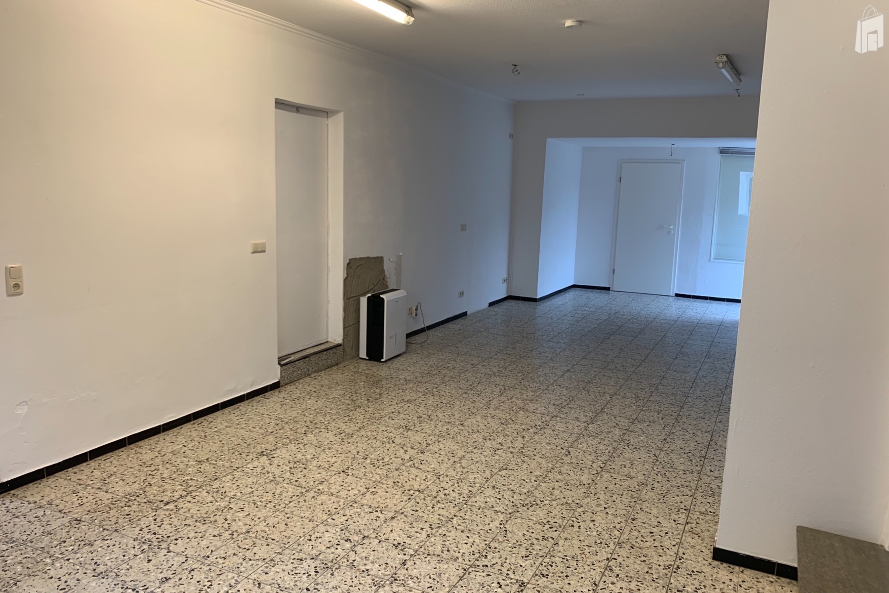 Aus Richtung Ladentür