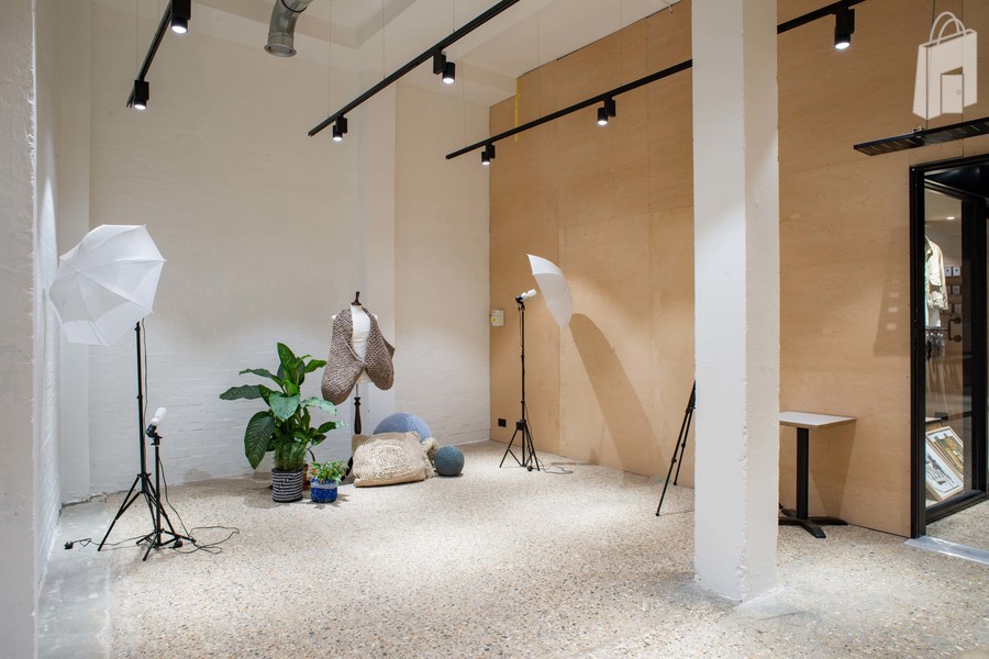 Exposed brick and plywood walls