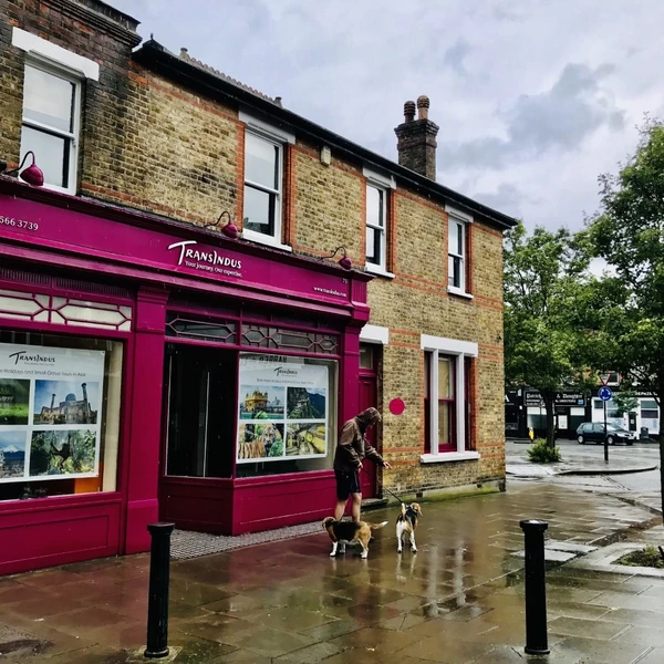 A prominent, period shop with large display windows & bright well lit interior
