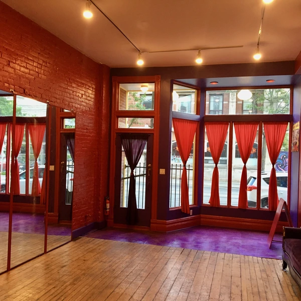 Open studio space, backyard, and upper floors if needed.