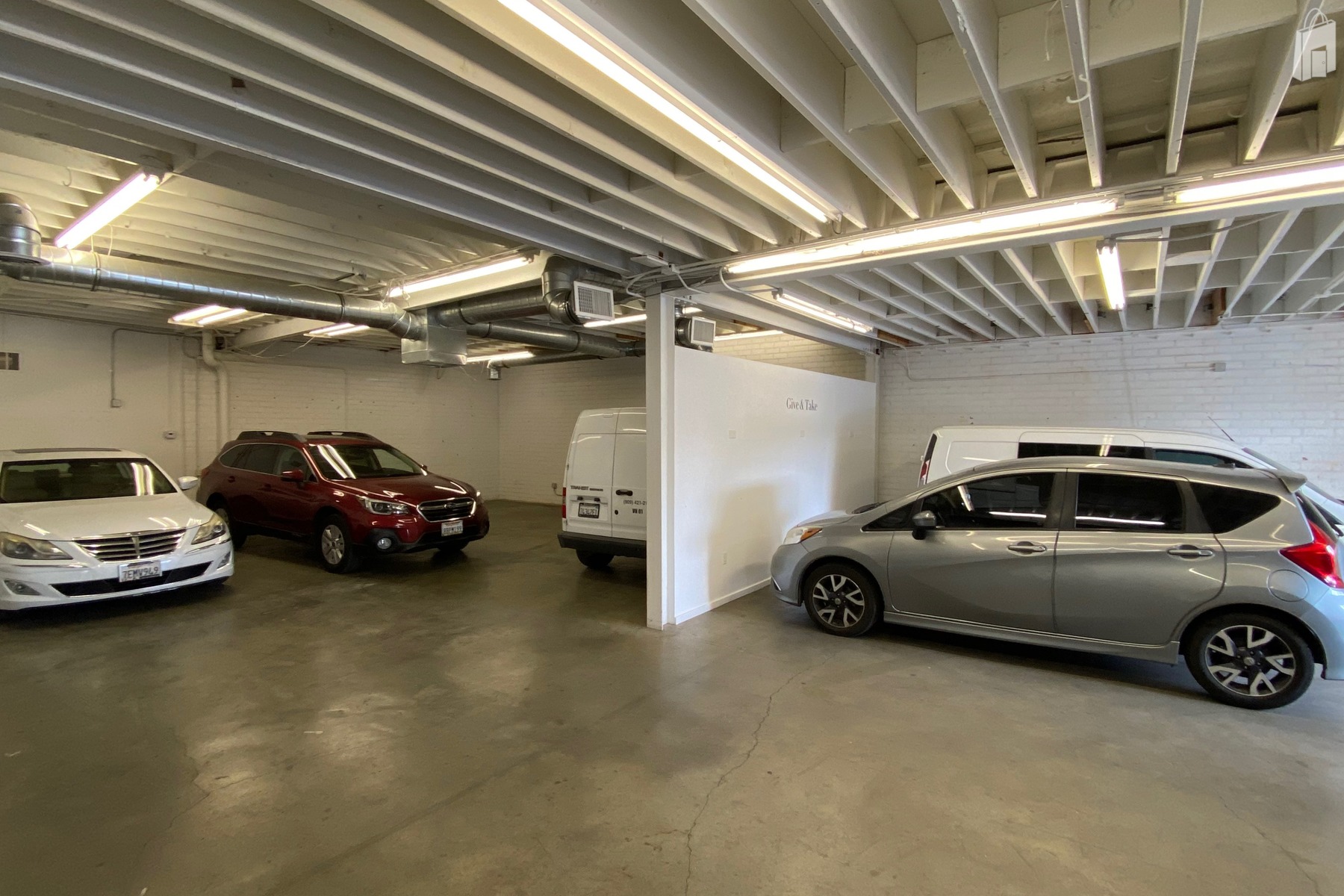 Cars parked in back room for unloading