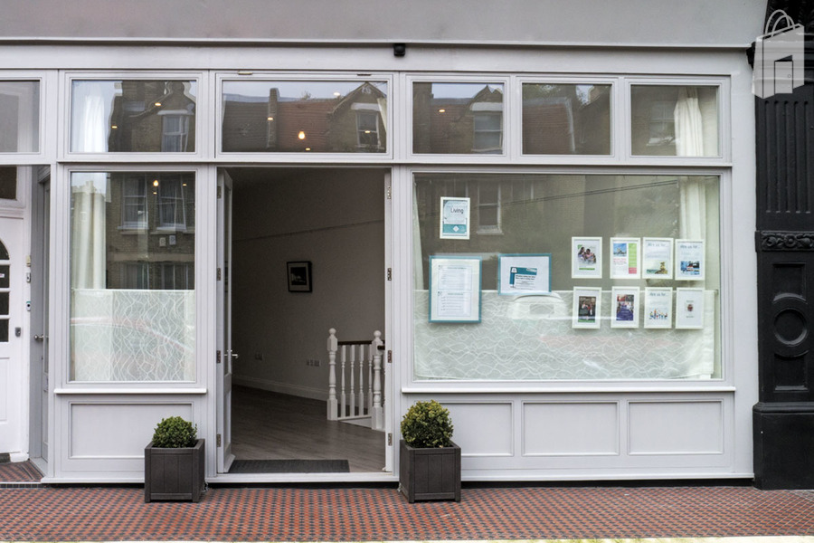 The Living Room Place front display window