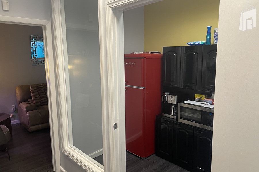 Modern Breakroom with Microwave & Fridge - Ideal for Cast, Crew, or Client Comfort in Astoria Rental Space