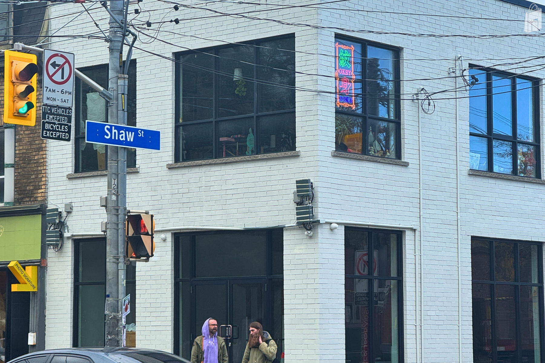 Corner Storefront Exterior – Queen & Shaw
